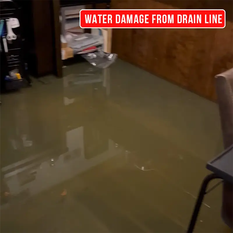 Public adjuster inspecting drain line water damage inside a Pennsylvania home